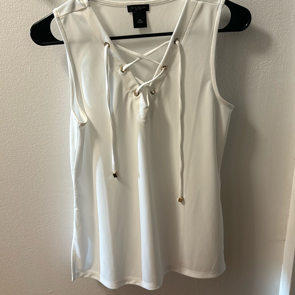 White blouse with gold detailing